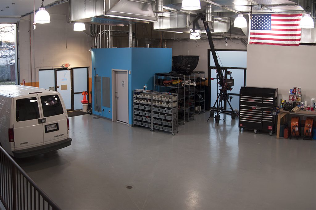 ThunderShot Studios truck bay and loading area with drive-in access, production equipment, and vehicle staging in Washington DC